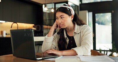 Buy stock photo Freelancer, burnout and woman with laptop in house, fatigue or research for logo design inspiration. Unhappy, graphic designer and Asian person with tech for ideas, remote work and bored by project