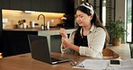 Remote work, wrist pain and woman in home, laptop for online article and inflammation. Freelancer, writer and person in kitchen, arthritis or carpal tunnel syndrome with pressure and joint injury