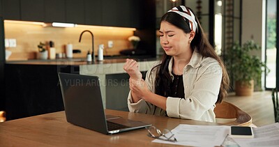 Buy stock photo Remote work, wrist pain and woman in home, laptop for online article and inflammation. Freelancer, writer and person in kitchen, arthritis or carpal tunnel syndrome with pressure and joint injury