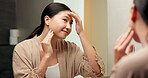 Self care, mirror and woman in bathroom for skincare, happy or dermatology for healthy skin and glow. Reflection, home and Asian person with smile, hygiene and grooming with cosmetics for beauty