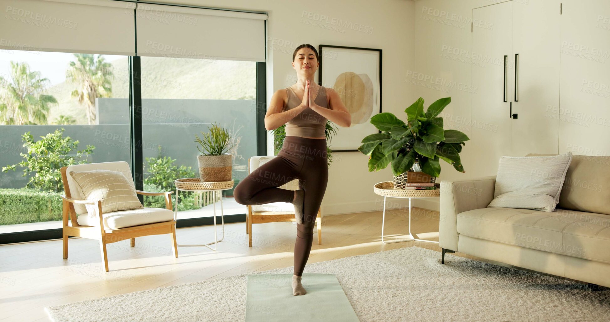 Buy stock photo Fitness, stretching and woman with yoga in home, holistic practice and balance activity for health. Posture, grounding routine and Asian person with tree pose for wellness, spiritual exercise or calm