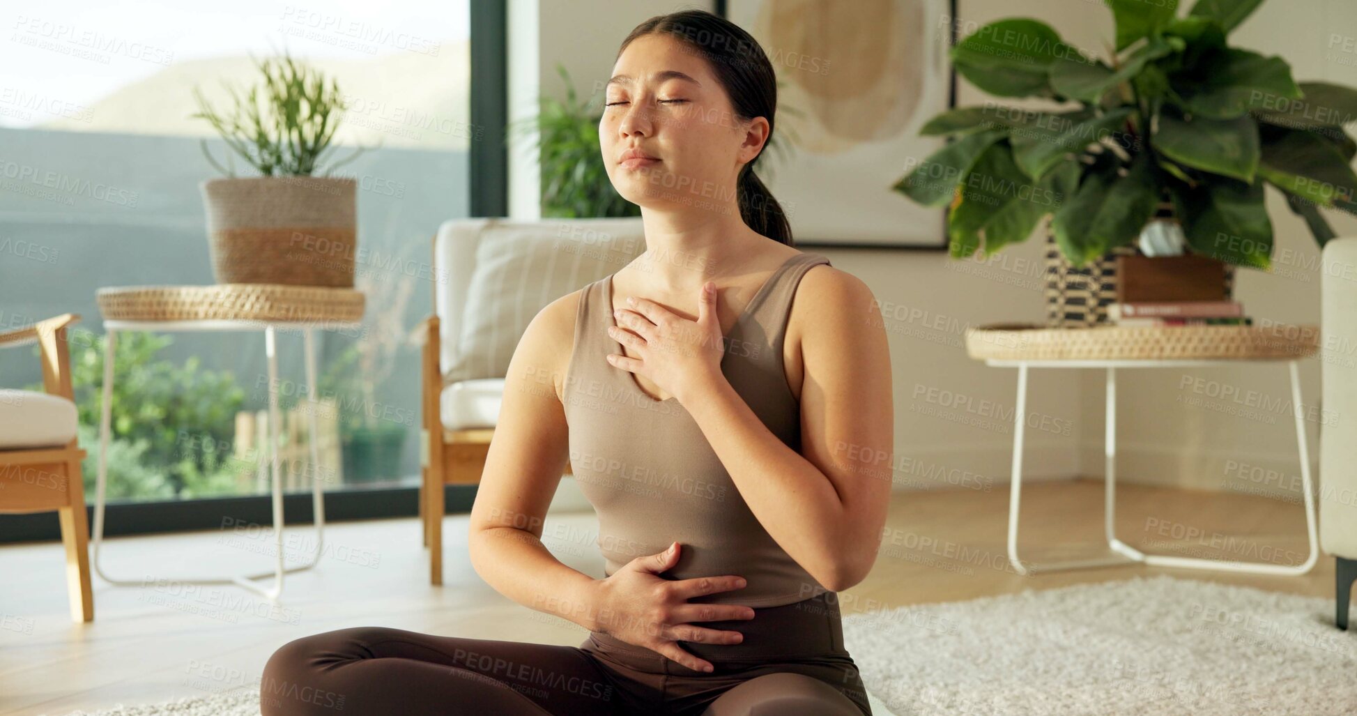 Buy stock photo Breathe, meditation and Asian woman in home with calm for mindfulness, wellness and inner peace. Morning, apartment and person on mat for breathing exercise, spiritual awareness and reflection