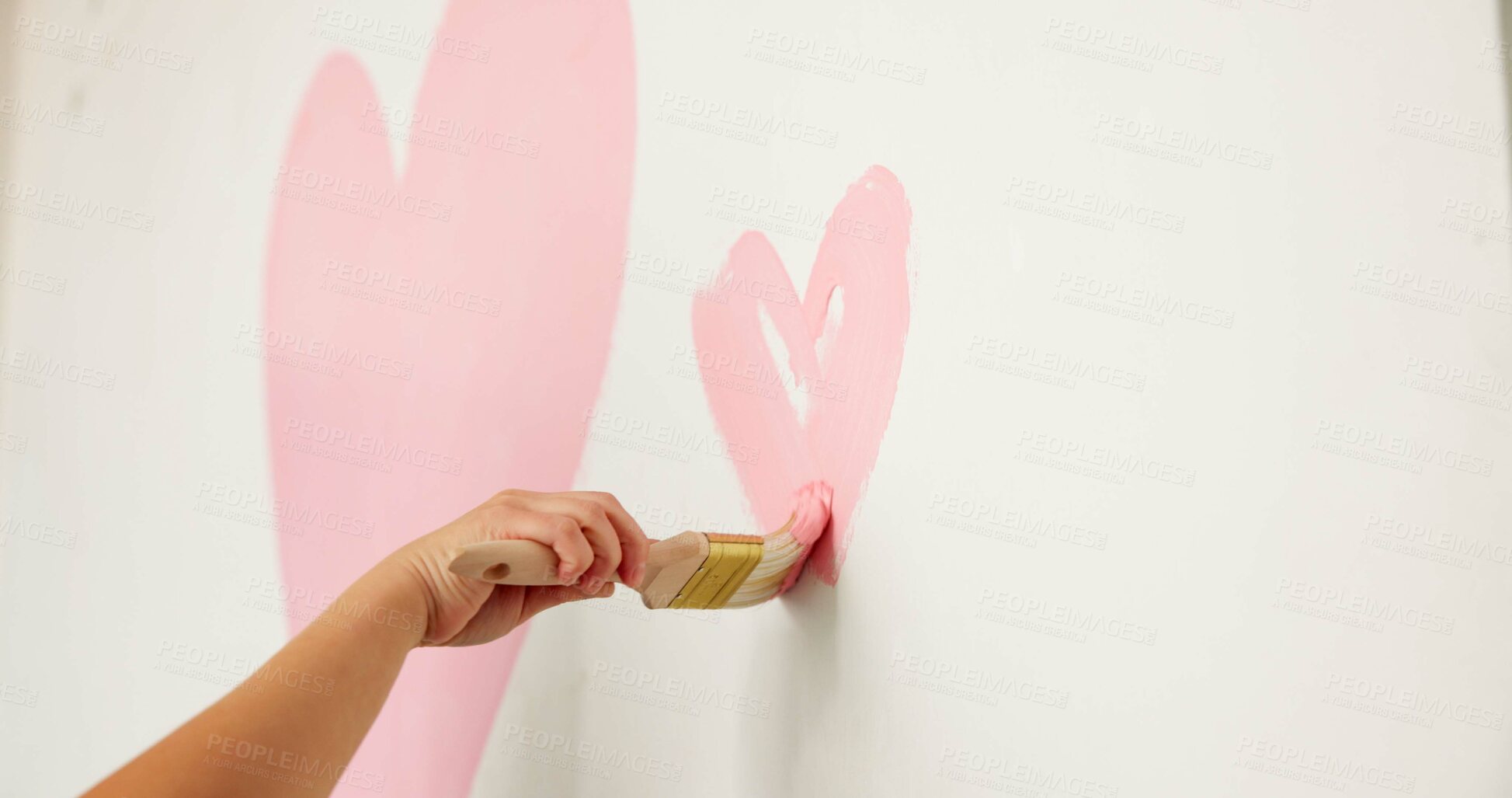 Buy stock photo Painting, wall and hands of person with heart for decoration, interior design and makeover for nursery. Home, space and painter with shape and creative project for remodeling, inspiration and nesting