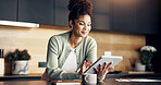 Finance, woman and smile with tablet in kitchen for insurance payout, loyalty reward or review. Budgeting, african person and happy with tech in home for positive credit score, tax refund or cashback