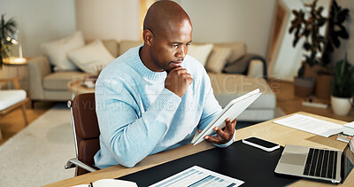 Buy stock photo Tablet, thinking and black man in home for financial report, budget planning and remote work. WFH, reading and person with documents, tech and research for finance review, accounting and evaluation
