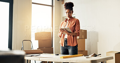 Buy stock photo Boxes, interior design and tablet with woman in new home for diy project or property renovation. App, planning and research with homeowner in apartment for development, improvement or investment