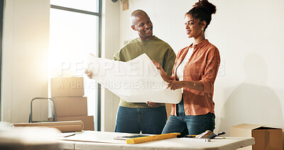 Buy stock photo Blue print, boxes and interior design with happy couple in new house together for diy or renovation. Conversation, planning and schematic with homeowner people in apartment for home improvement