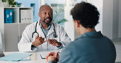 Buy stock photo Healthcare, doctor and man with patient in hospital, talk and medical advice for wellness in office. Health professional, appointment and explaining diagnosis to person, consultation and discussion