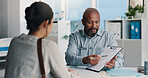 Healthcare, doctor and man with clipboard, diagnosis and medical advice for patient or conversation. Health professional, talking and explaining test results to person, pointing or question in clinic
