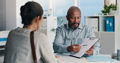 Buy stock photo Healthcare, doctor and man with clipboard, diagnosis and medical advice for patient or conversation. Health professional, talking and explaining test results to person, pointing or question in clinic