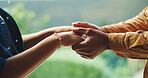 Love, couple and holding hands outdoor for trust, relationship wellness and safety together. Connection, man and woman with security at park for support, care and commitment to partner with loyalty