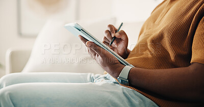 Buy stock photo Hands, graphic designer and drawing at house with tablet, research and sketch for logo design. Person, stylus and freelancer in lounge with digital, editing animation and creative artwork for project