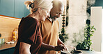 Cooking, help or couple in kitchen with love, bonding activity or connection with meal prep. Smile, support or mature people in home with food, happy moment or culinary hobby in healthy relationship.