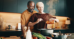 Cooking, smile or couple in kitchen with love, bonding activity or connection with meal prep. Support, care or mature people in house with food, happy moment or culinary hobby in healthy relationship