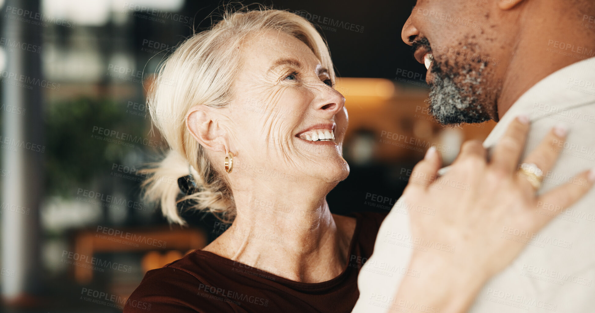 Buy stock photo Love, woman or interracial couple in house with hug, partner care or bonding on weekend break. Smile, trust or mature people with embrace, happy moment or romantic connection in healthy relationship.