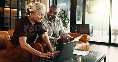 Buy stock photo Interracial couple, laptop and smile with paperwork in home for mortgage, bills or investment. Mature man, woman and document with tech for financial planning, budget expenses or invoices together