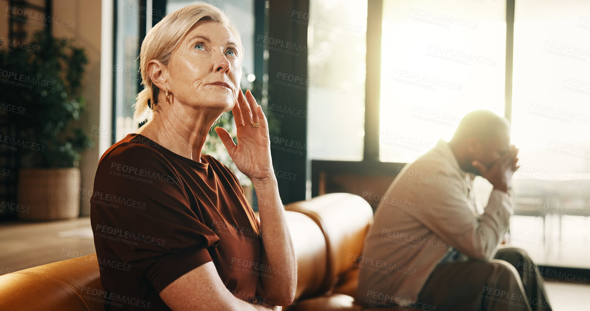 Buy stock photo Upset, argument and couple on sofa in home with conflict, disagreement or divorce in living room. Ignore, toxic marriage and mature man with woman for separation, breakup or dispute in apartment.