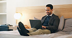 Happy, businessman and relax in bedroom with tablet, social media or browsing website to unwind. Smile, corporate and person in home with digital, streaming movie and watching video for weekend break