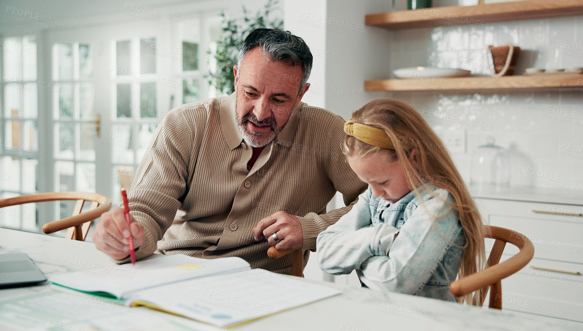 Buy stock photo Dad, teaching and learning with difficult child in home for development challenge, boredom or ADHD. Father, lazy kid or stubborn daughter with arms crossed for homework or failed assessment in house