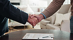 Handshake, documents and business men in home for finance deal, negotiation or partnership. Contract, discussion and financial manager shaking hands with client for investment proposal in house.
