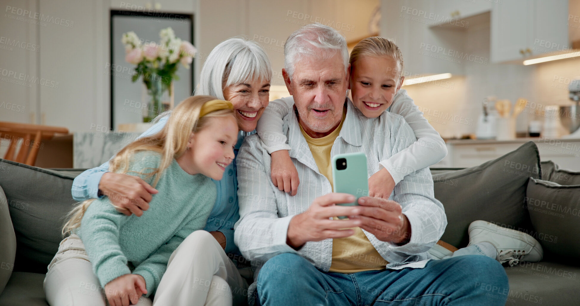 Buy stock photo Selfie, relax and grandparents with children on sofa in home for love, social media post and digital memory. Photography, support and visit with senior man and woman with kids in living room in house