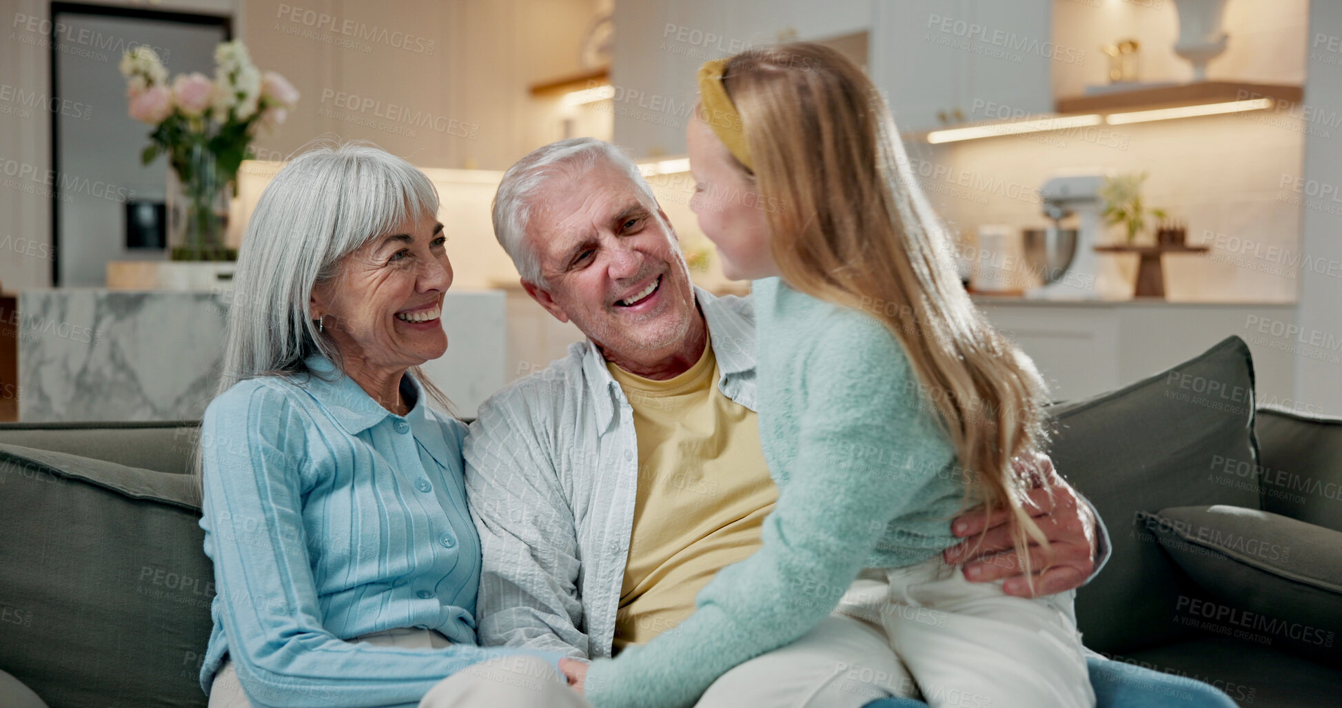 Buy stock photo Smile, grandparents and child on sofa with care, bonding together and support in loving relationship. Trust, family and grandchild in house with embrace, security and happy connection in childcare.