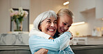 Trust, grandmother and girl in house with hug, bonding together and support in childcare. Smile, family and grandchild in home with embrace, security and happy connection in loving relationship.