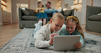 Buy stock photo Tablet, relax and kids on floor in home for watching movie, series or video on app together. Happy, digital technology and girl children streaming show online for subscription service on weekend.