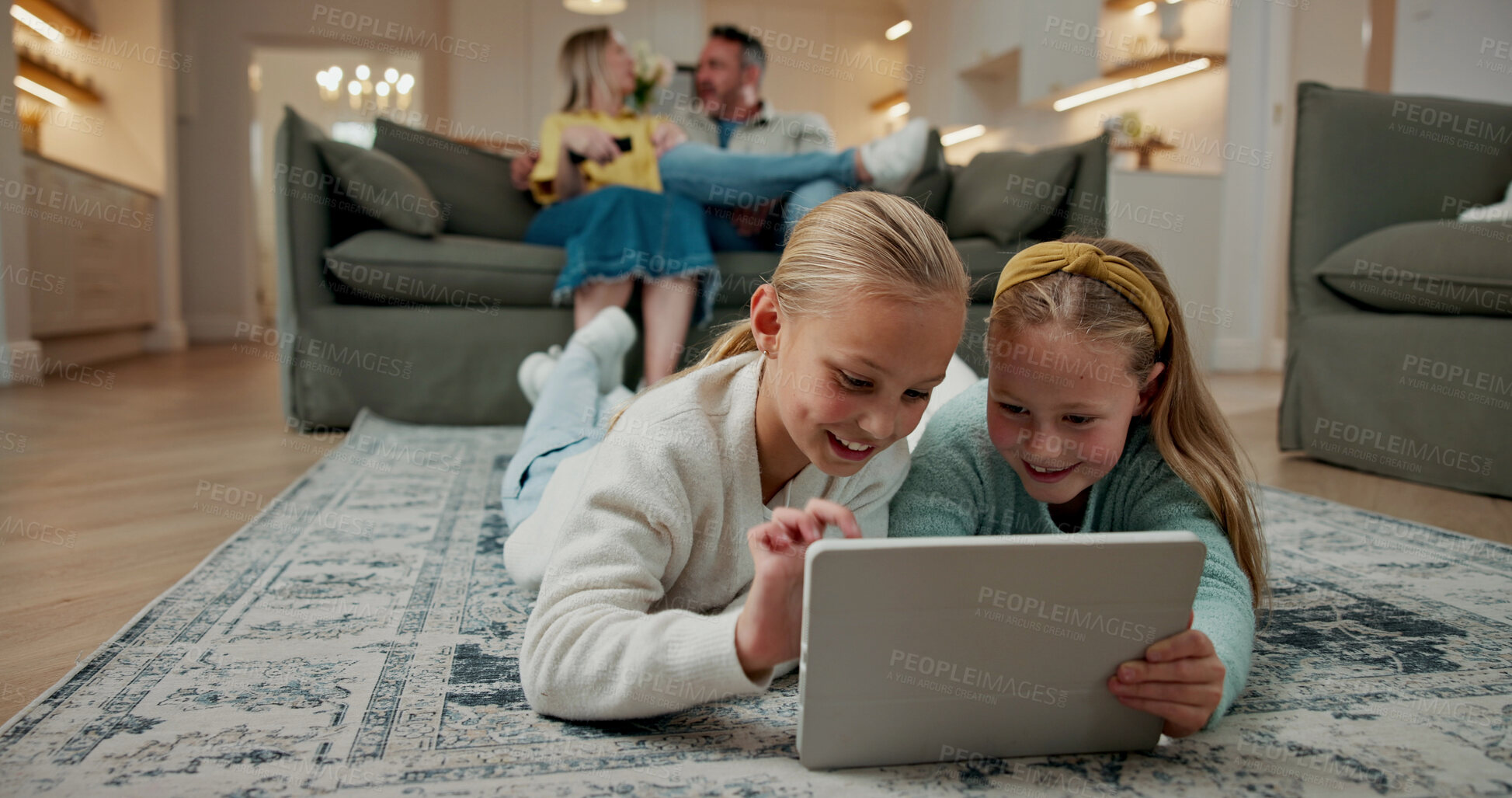 Buy stock photo Tablet, relax and kids on floor in home for watching movie, series or video on app together. Happy, digital technology and girl children streaming show online for subscription service on weekend.