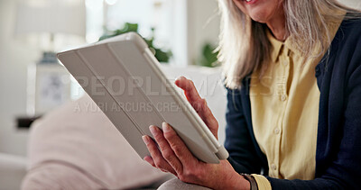 Buy stock photo Hands, old woman and rest in home with tablet, social media and streaming movies in lounge. Senior person, scroll and relax at house with digital, browsing website and download games in living room
