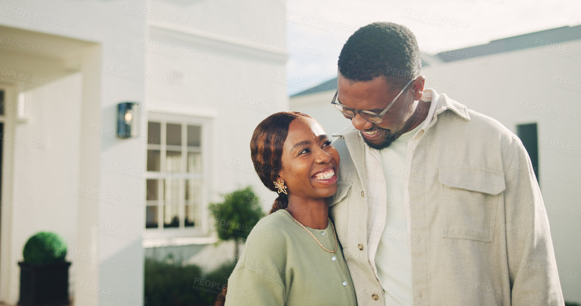 Buy stock photo Hug, happy and couple outdoor for new house, relocation and moving in for future together. Laugh, real estate and black man and woman embrace for bonding, love and excited for property purchase