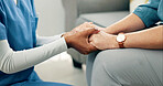 Nursing home, caregiver and holding hands with old person in lounge, help or compassion with gesture. Assisted living, nurse and empathy for elderly patient, kindness and healthcare services in house