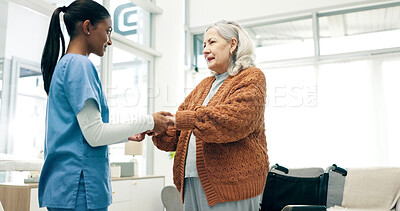 Buy stock photo Wheelchair, physio and old woman holding hands for help, support and rehabilitation in nursing home. Healthcare worker, assistance and senior person with disability, physical therapy and recovery.