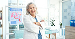 Portrait, happy and mature doctor for healthcare, medical career and pulmonary service in clinic. Specialist, hospital and woman with crossed arms for wellness, medicare and lung disease consultant