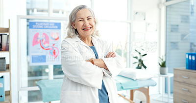 Buy stock photo Portrait, happy and mature doctor for hospital, medical career and pulmonary service in clinic. Specialist, healthcare and woman with crossed arms for wellness, medicare and lung disease consultant