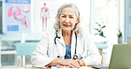 Portrait, doctor and mature woman in office with laptop, medical research and smile for experience. Happy, person and computer in clinic with pride, healthcare service and expertise for patient care.