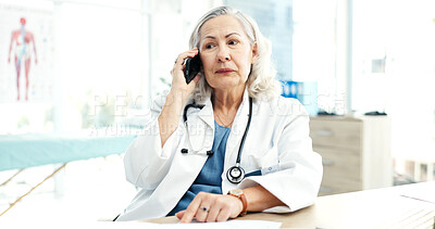 Buy stock photo Woman, doctor and talk in hospital with phone call, discussion or consulting for medical results. Mature person, mobile and consultation in office for telehealth, contact patient and diagnosis update