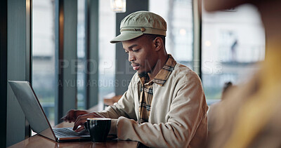 Buy stock photo Typing, remote work and man with laptop in coffee shop, research and editing article for brand blog. Review, serious and freelance writer with pc for digital marketing, story development and cafe