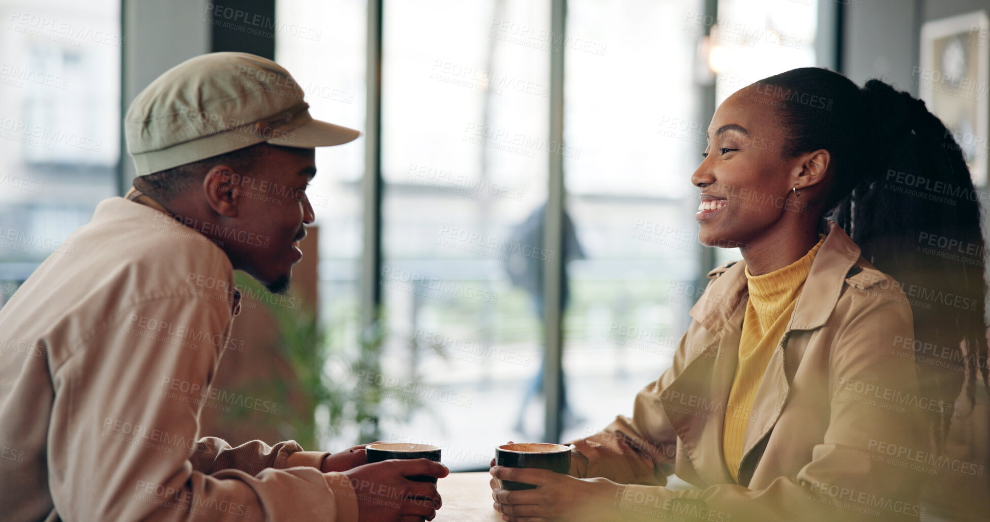 Buy stock photo Couple, happy or conversation at cafe for date, bonding and together for joke, love and trust. Black man, woman and  communication with humor at coffee shop, chat or catch up for healthy relationship