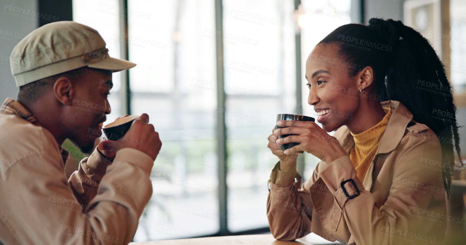 Buy stock photo Couple, happy and drink with conversation at cafe for date, bonding and together for love. Black man, woman and  communication with tea at coffee shop, chat or catch up in healthy relationship