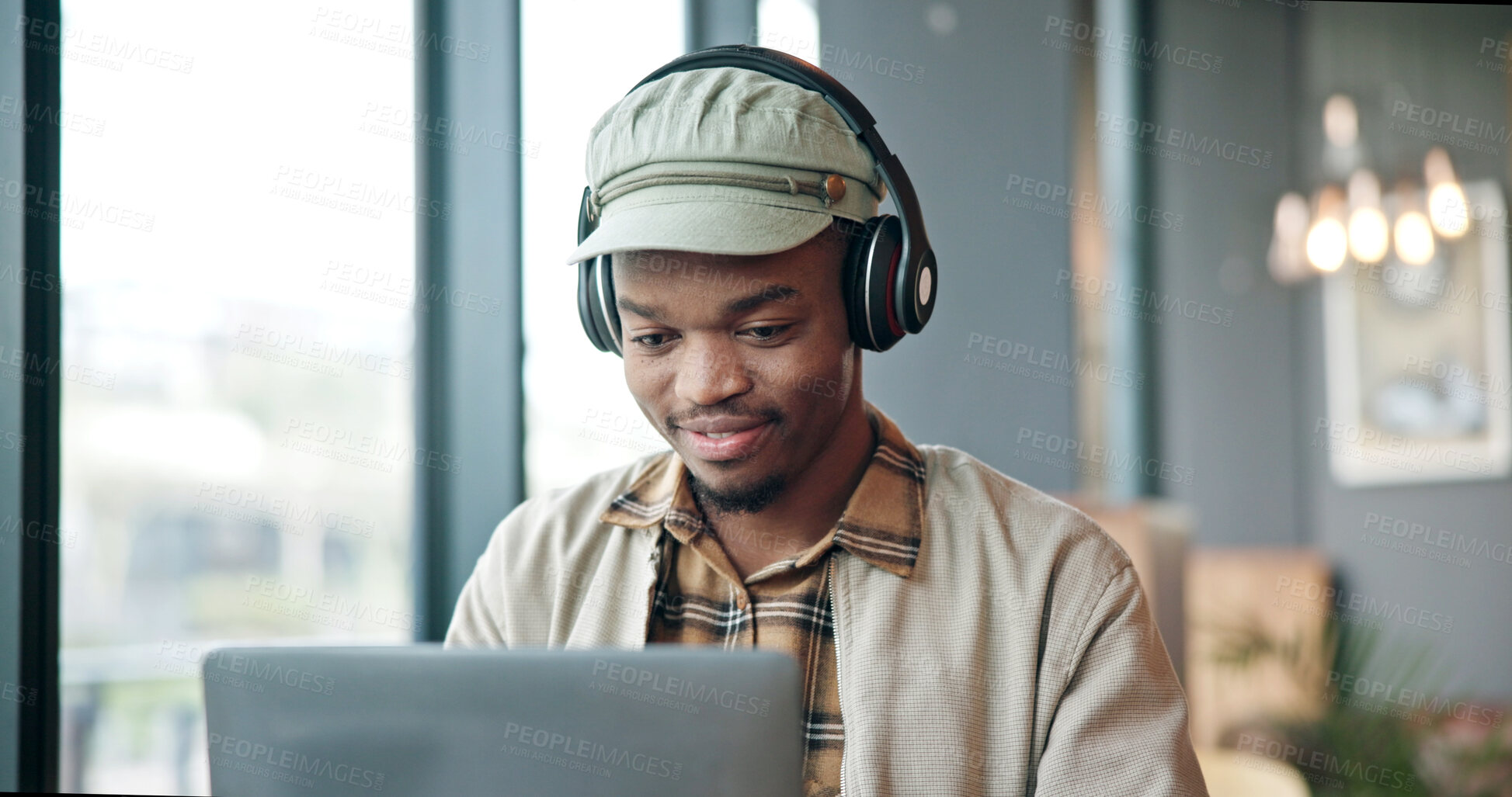 Buy stock photo Headphones, research and black man with laptop in office for creative project with music. Reading, audio tech and African male magazine editor with playlist on article with publishing in workplace.