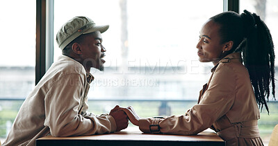 Buy stock photo Happy, couple and holding hands at cafe on date, love and affection for bonding together. Smile, black people and talk at coffee shop with romance, healthy relationship and connection for commitment