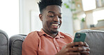Smile, phone and black man on sofa in home with networking, connection or texting on mobile app. Relax, technology and African male person with cellphone for chatting, communication or social media.