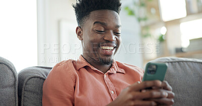 Buy stock photo Smile, phone and black man on sofa in home with networking, connection or texting on mobile app. Relax, technology and African male person with cellphone for chatting, communication or social media.