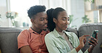 Couple, online and relax with phone in lounge, entertainment and streaming videos with subscription. Black people, scroll and happy with partner on couch, love and watch movie with mobile in house