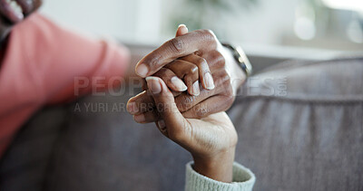 Buy stock photo Couple, holding hands and bonding on couch, home and connection with partner on break or commitment. People, love and affection for spouse, comfort and support with gesture on weekend and romance