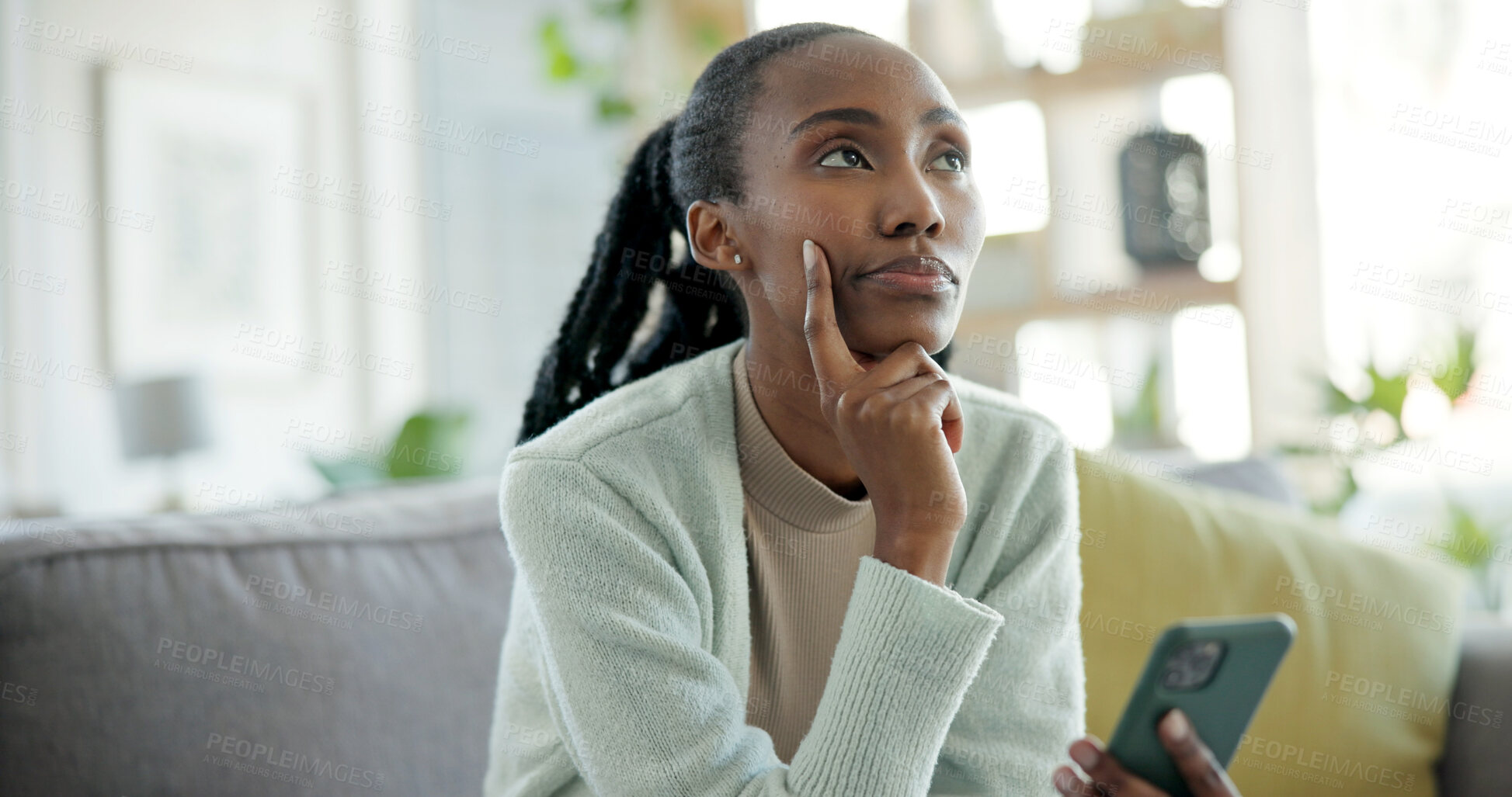 Buy stock photo Thinking, phone and black woman on sofa in home with networking, connection or texting on mobile app. Relax, decision and female person with cellphone for chatting, communication or social media.