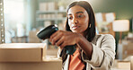 Woman, distribution or scan box in workplace for inventory check, ecommerce or pricing at boutique. Happy, person or employee with barcode for info, logistics tracking or app for shipping schedule