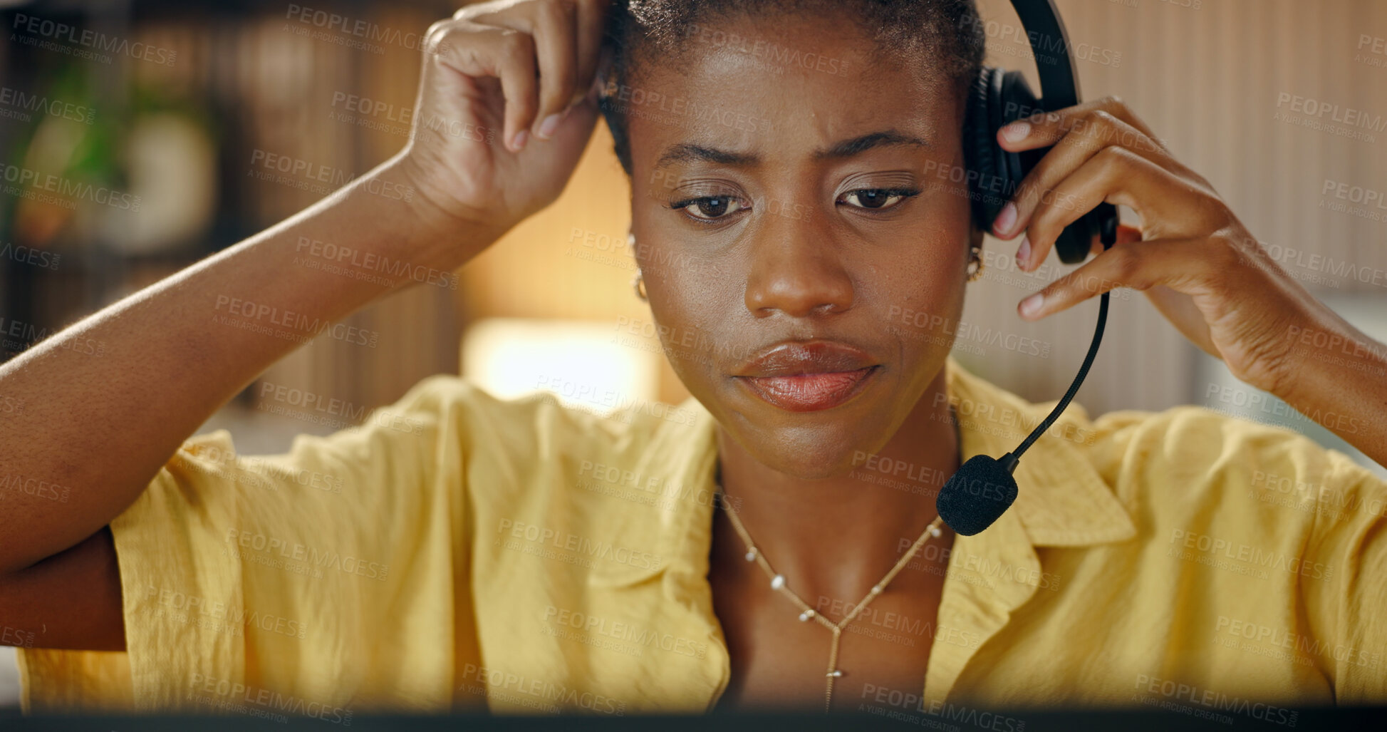 Buy stock photo Woman, headset and remote work at night with laptop, customer service and mistake for crm. Concern, African person or freelancer with pc for working late, assistance fail and telecom inquiry at house