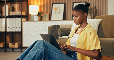 Buy stock photo Online, research and woman with laptop in lounge, digital marketing and freelance ad campaign on web. Creative, black person and editing article with tech, social media manager or remote work in home